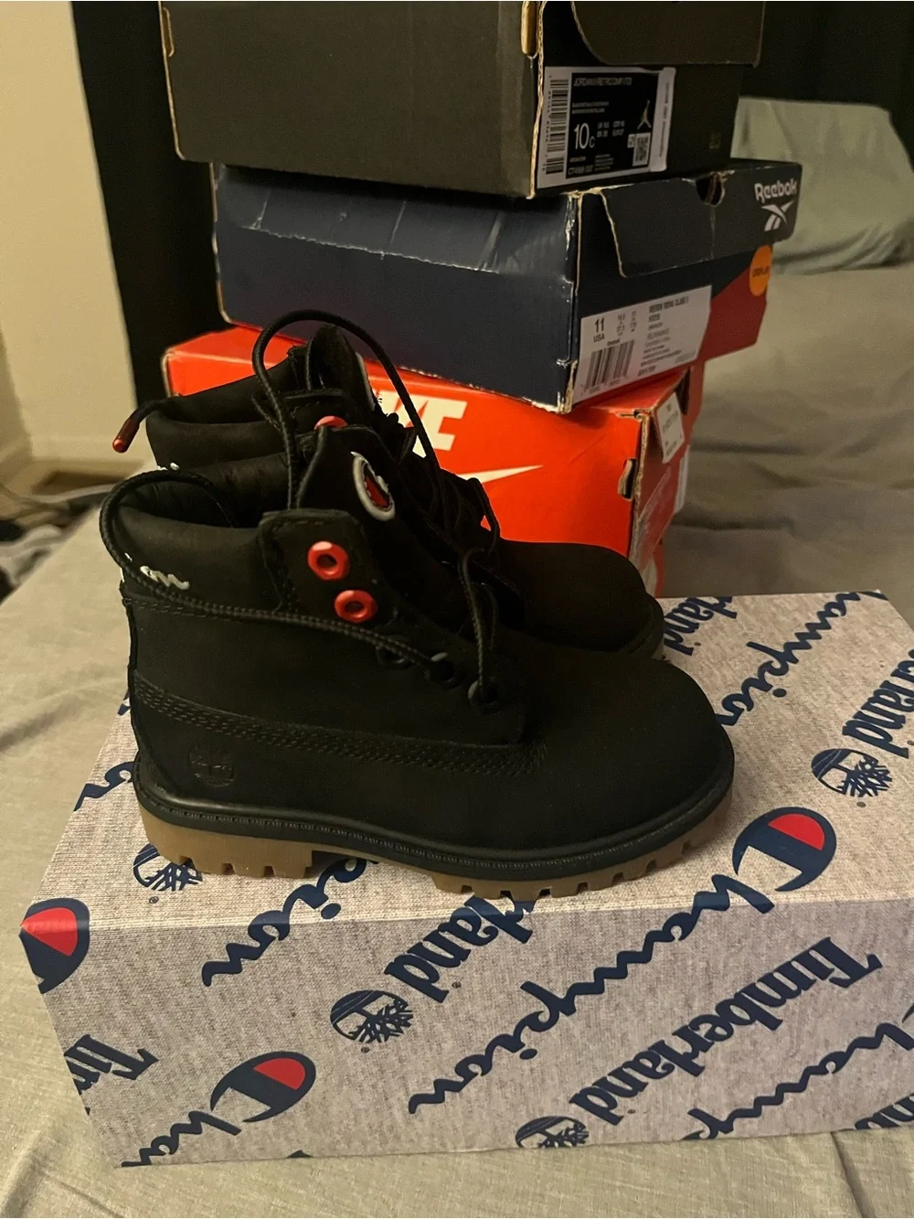 Timberland Kids Black Lace-Up Boots with Brown Outsole and Red Eyelets